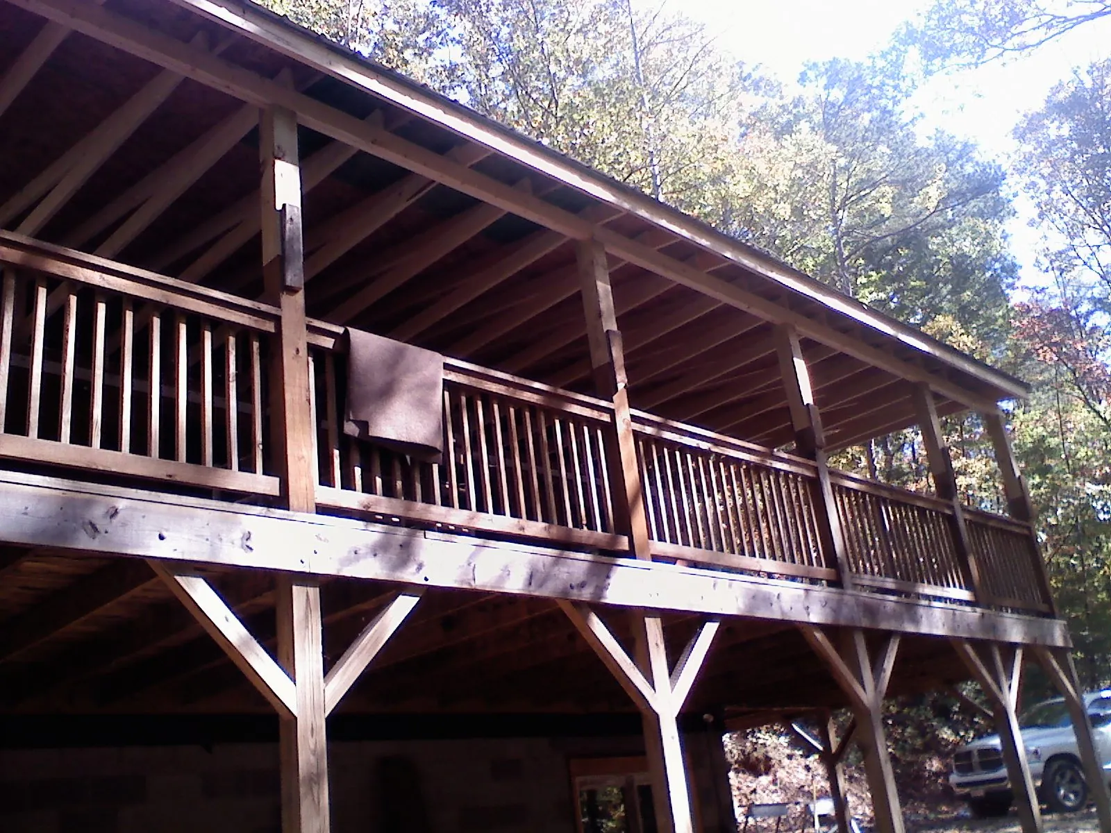 Timber framing under a new elevated porch and deck — Roof Leak Repair in Collbran by Roofing Brothers